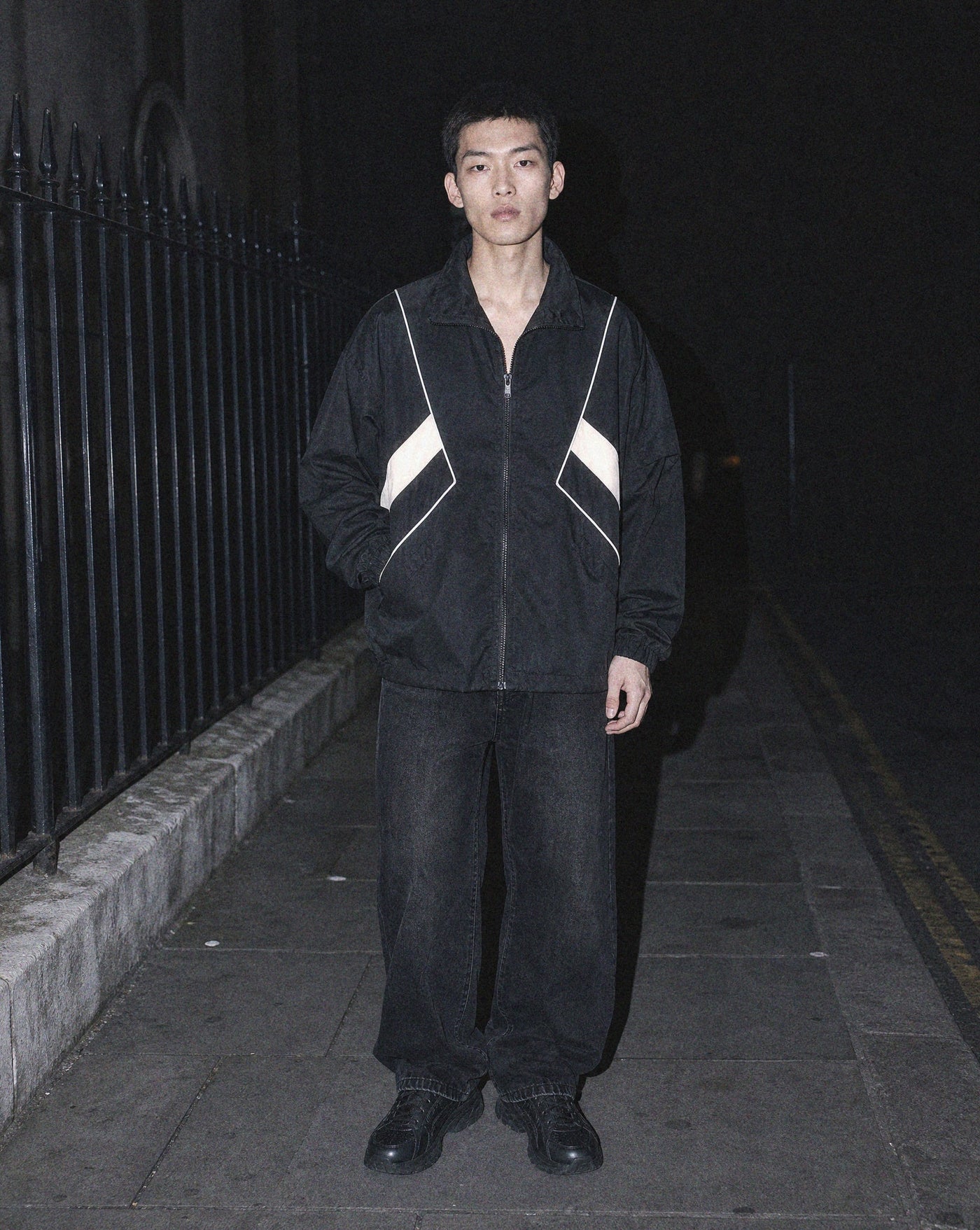 BLNKA editorial - Black Windbreaker