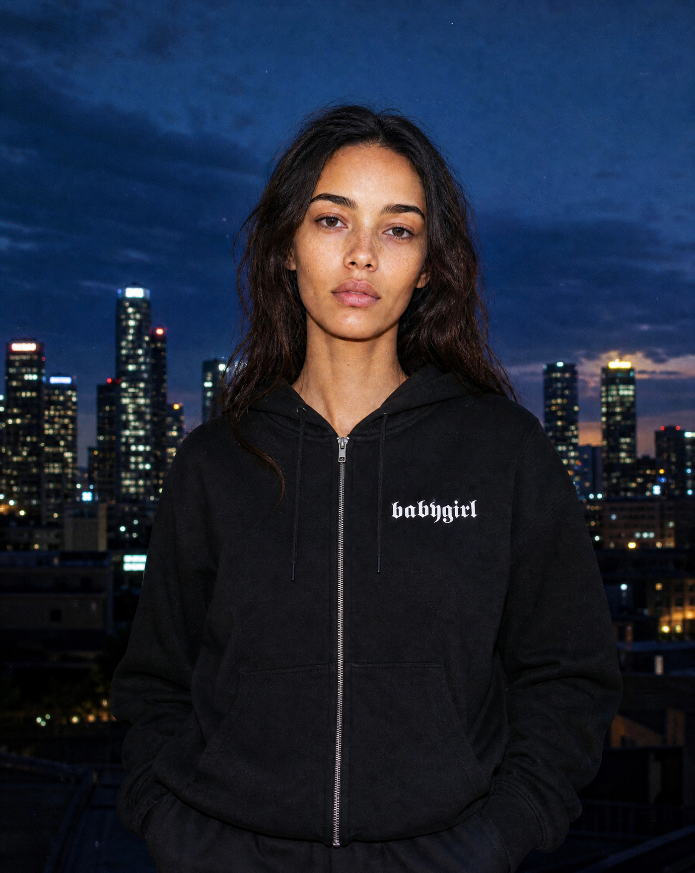Bulletin Zip Knit — black zip-up knit hoodie on female model by Sulta Studios