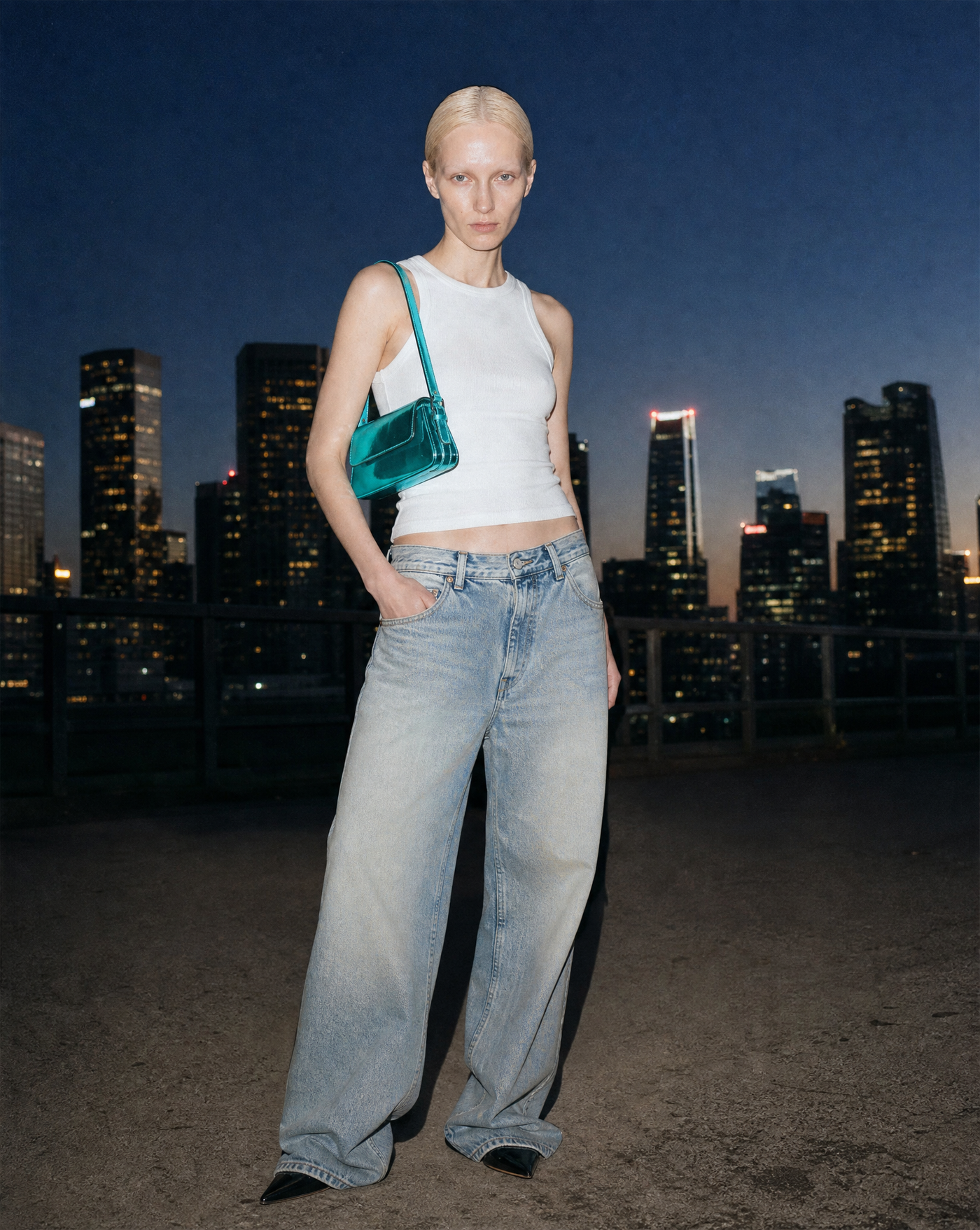 Chrome Shoulder Bag — female model editorial shot by Sulta Studios