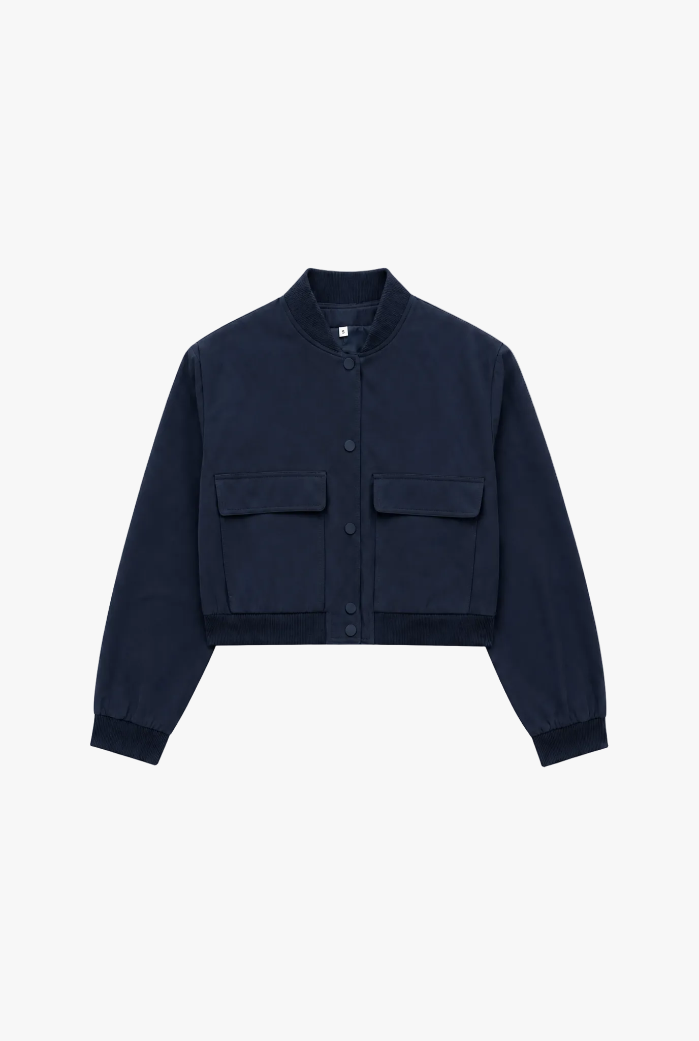 Quartermaster Jacket — dark blue cropped bomber jacket with pockets flat lay by Sulta Studios