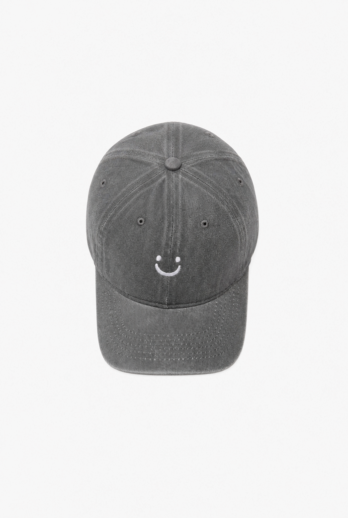 Smile Face Cap flat-lay
